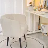A white fluffy chair is placed next to a desk in a well-lit room. Produktbild-Vorschau