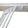 Close-up view of a white retractable clothes drying rack mounted on a wall. Anteprima dell’immagine prodotto