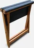 A folded wooden lounge chair with anthracite fabric. Produktbild-Vorschau