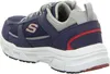 A side view of a navy blue Skechers sneaker with gray and red accents. Anteprima dell’immagine prodotto