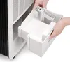 A person's hands are shown removing a water collection tank from a dehumidifier. Produktbild-Vorschau