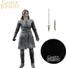 A Game of Thrones Arya Stark action figure with accessories and a display stand. Náhled obrázku produktu