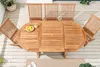 An outdoor dining set on a wooden deck. Produktbild-Vorschau