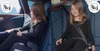 Two images of a young girl in a car seat, one looking out the window and the other smiling at the camera. Produktbild-Vorschau
