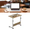 A portable, adjustable work table with a laptop on it. Produktbild-Vorschau