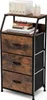 A product shot of a vintage-style storage cabinet with three fabric drawers. Náhled obrázku produktu