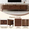 A modern wooden TV stand with drawers and sliding doors, featuring solid wood legs and rounded corners, presented with close-up feature highlights. Podgląd zdjęcia produktu