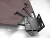 A close-up view of the corner of a taupe fabric privacy screen, showing its metal frame and mounting bracket. Produktbild-Vorschau