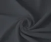 A close-up shot of dark gray fabric, folded into a swirl. Produktbild-Vorschau