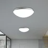 Two ceiling lights are shown mounted on a light gray ceiling in a hallway. Náhled obrázku produktu