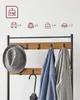 Product information graphic above a coat rack with items on it. Náhled obrázku produktu