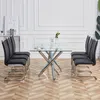 A dining set with a glass table and chairs in a room. Podgląd zdjęcia produktu