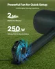 A black fan blowing air into an inflatable tube on a grassy surface. Anteprima dell’immagine prodotto