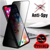 A smartphone with a privacy screen protector is displayed diagonally on a laptop. Produktbild-Vorschau