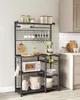 A kitchen baker's rack filled with various kitchen appliances and accessories. Produktbild-Vorschau