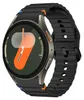 A smartwatch with a black silicone band and a gray casing, displayed against a white background. Náhled obrázku produktu