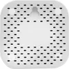 The back of a white electronic device with ventilation holes and mounting features. Produktbild-Vorschau