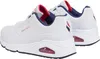 A pair of white Skechers Uno women's sports shoes are shown from a side-angle perspective against a white background. Anteprima dell’immagine prodotto