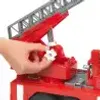 A hand is shown operating a part of a red toy fire engine with a ladder. Anteprima dell’immagine prodotto