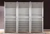 An open, empty white wardrobe with multiple shelves. Produktbild-Vorschau
