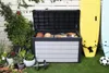 An outdoor storage box filled with sports equipment, next to surfboards and plants. Podgląd zdjęcia produktu