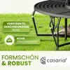 A close-up of a black metal garden bench leg with green grass in the background and marketing text overlays. Produktbild-Vorschau