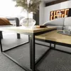 A modern living room scene featuring a nesting coffee table set. Náhled obrázku produktu