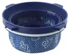 A blue vacuum cleaner filter with a white band and blue patterned fabric. Produktbild-Vorschau