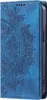A blue flip case for a Google Pixel 8a phone with a mandala pattern embossed on the cover. Produktbild-Vorschau