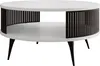 A round coffee table with a white top and shelf, and a slatted black base and legs. Produktbild-Vorschau