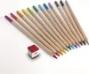 A collection of colored pencils arranged diagonally on a white background, with a small pencil sharpener in the foreground. Voir les images du produit