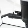 A close-up view of a black plastic water pump with a clear tube attached. Produktbild-Vorschau