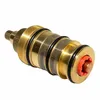 A brass thermostatic faucet cartridge with black O-rings and a red plastic component on a white background. Produktbild-Vorschau