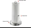 A stainless steel kitchen roll holder with a roll of paper towels on a white background. Podgląd zdjęcia produktu