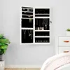 A white jewelry cabinet with its doors open, mounted on a light gray wall. Náhled obrázku produktu