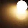 A close-up of a bright LED light bulb emitting warm yellow light. Produktbild-Vorschau