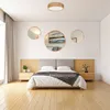 A bedroom scene with a bed, nightstands, and decorative elements. Produktbild-Vorschau