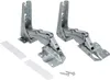 A pair of cabinet hinges with screws and two white strips. Produktbild-Vorschau