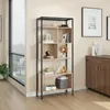 A modern bookshelf filled with decorative items in a room setting. Produktbild-Vorschau