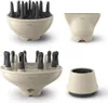 A collage of four different hair dryer attachments on a white background. Produktbild-Vorschau