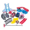 A collection of Paw Patrol toys, including vehicles, figures, and playset components, laid out on a white background. Produktbild-Vorschau