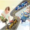 Two children playing with transforming robot toys on a race track. Náhled obrázku produktu