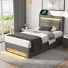 A modern bedroom with a grey upholstered bed frame featuring LED lighting. Produktbild-Vorschau