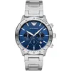 A close-up, front-facing studio shot of a men's wristwatch with a blue dial and silver metal band, set against a white background. Náhľad obrázku produktu