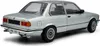 A rear-view shot of a silver BMW 323i E21 model car. Anteprima dell’immagine prodotto