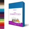 A folded blue fitted sheet is shown on a white background, with a side panel displaying various colors of the same product. Produktbild-Vorschau