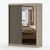 A wardrobe with sliding doors, one of which is mirrored and shows a bedroom interior. Náhled obrázku produktu