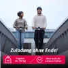 A man and a woman riding electric scooters on a bridge. Produktbild-Vorschau
