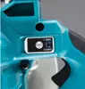 A close-up of a control panel on a teal-colored power tool, showing an on/off switch with indicator lights and a wireless symbol. Anteprima dell’immagine prodotto