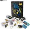 A collection of Batman-themed advent calendar items are spread out on a white surface, with the advent calendar box prominently displayed in the background. Anteprima dell’immagine prodotto